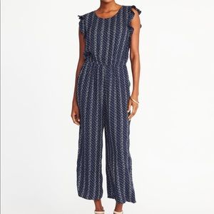 Floral printed Jumpsuit.Size L. Cropped.